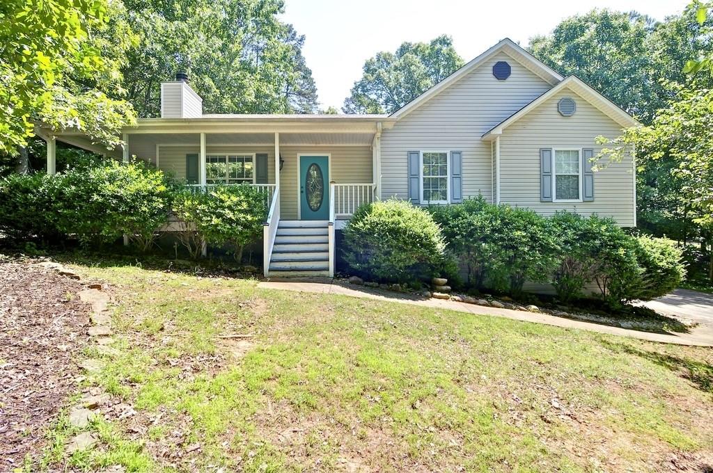 69 Ivy Ridge Drive Jasper, GA 30143 - Photo 1 of 1 Front Exterior of home with partial wrap around porch. Large enough to put your rocking chairs and porch swing.