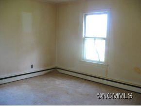 26 Harry Rogers Road Canton, NC 28716 - Photo 11 of 13 an empty room with window