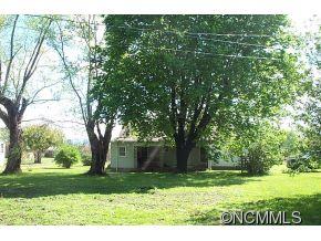 26 Harry Rogers Road Canton, NC 28716 - Photo 3 of 13 a view of a yard with a tree