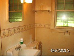 26 Harry Rogers Road Canton, NC 28716 - Photo 9 of 13 a bathroom with a bathtub and shower
