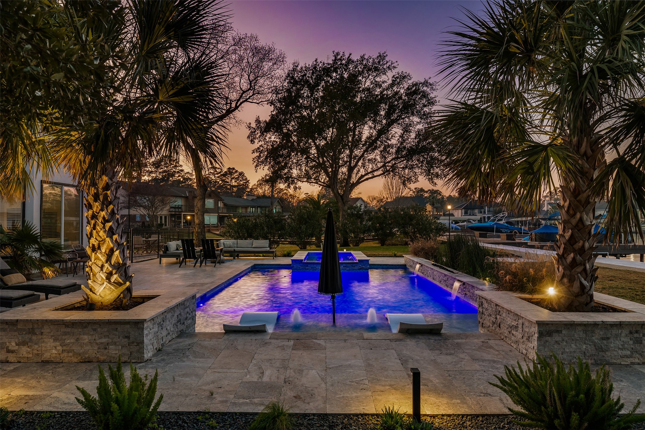 11706 Edgewater Court Montgomery, TX 77356 - Photo 4 of 50 Travertine wrapped pool and spa