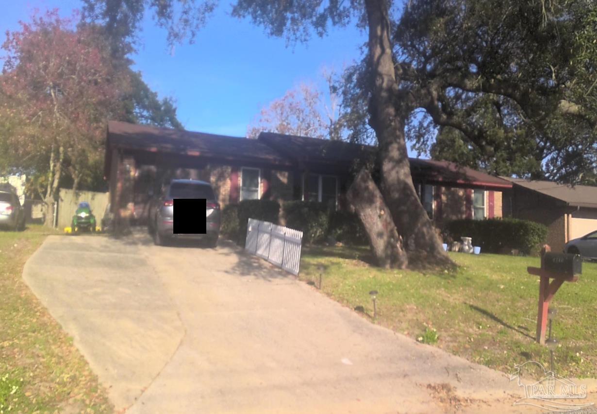 4710 Anchor Lane Pensacola, FL 32514 - Photo 1 of 11 a view of a house with snow in the yard