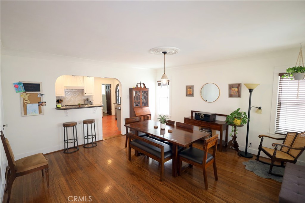 226 Orizaba Avenue Long Beach, CA 90803 - Photo 11 of 39 a living room with furniture and a wooden floor