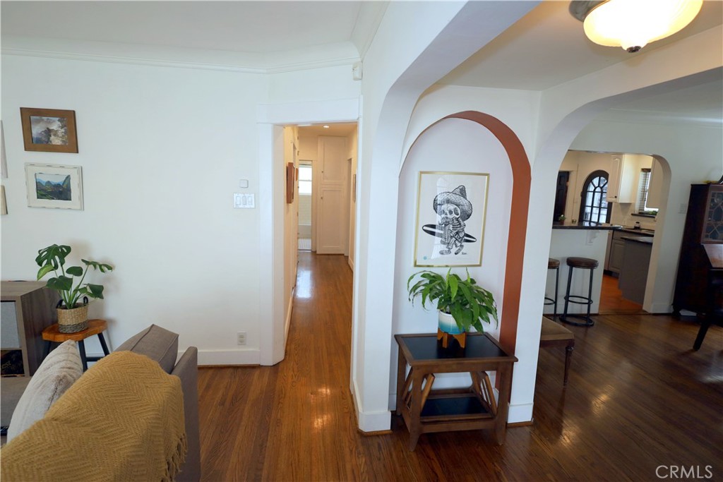 226 Orizaba Avenue Long Beach, CA 90803 - Photo 12 of 39 a living room with furniture and a potted plant