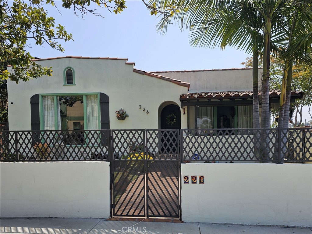226 Orizaba Avenue Long Beach, CA 90803 - Photo 2 of 39 a view of a house with a tree