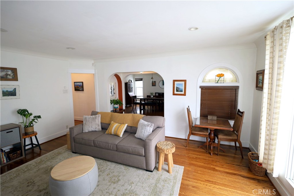 226 Orizaba Avenue Long Beach, CA 90803 - Photo 7 of 39 a living room with furniture and a rug