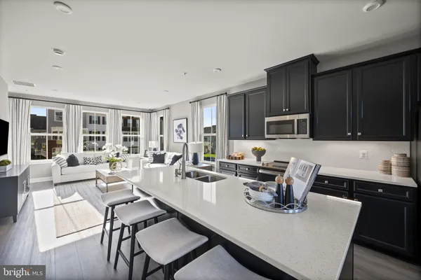 a view of balcony with wooden floor and fence