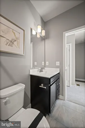a bathroom with a sink and a toilet