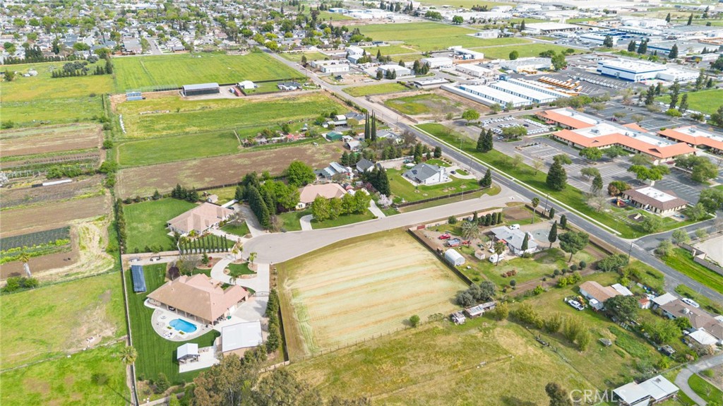 965 Bryant Court Merced, CA 95341 - Photo 7 of 12 an aerial view of residential houses with outdoor space