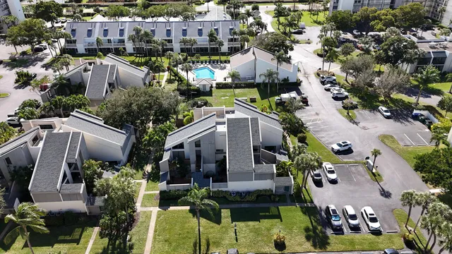 a view of a backyard with sitting area