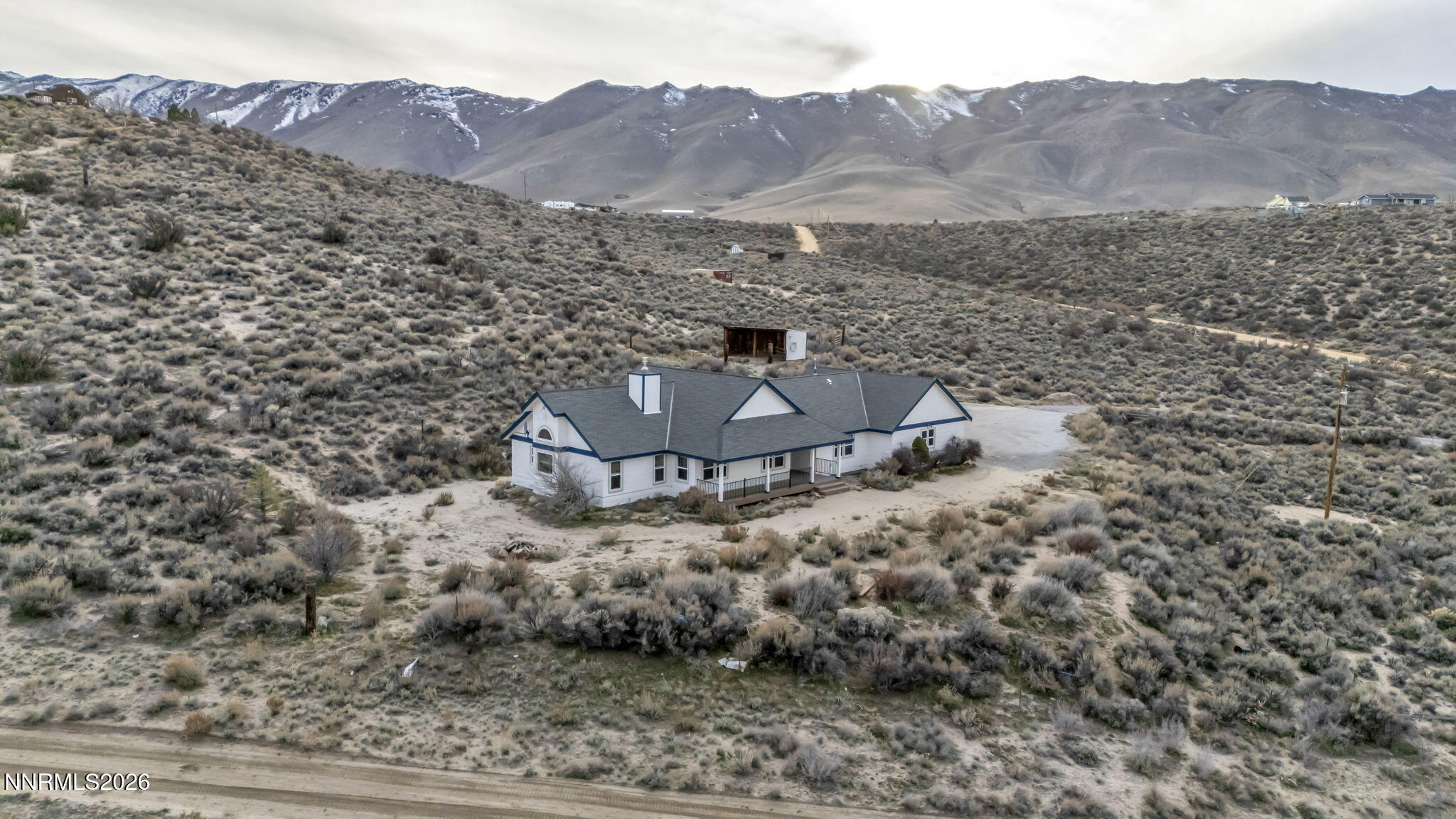 45 Arabian Way Reno, NV 89508 - Photo 13 of 44 a view of a house with a mountain forest
