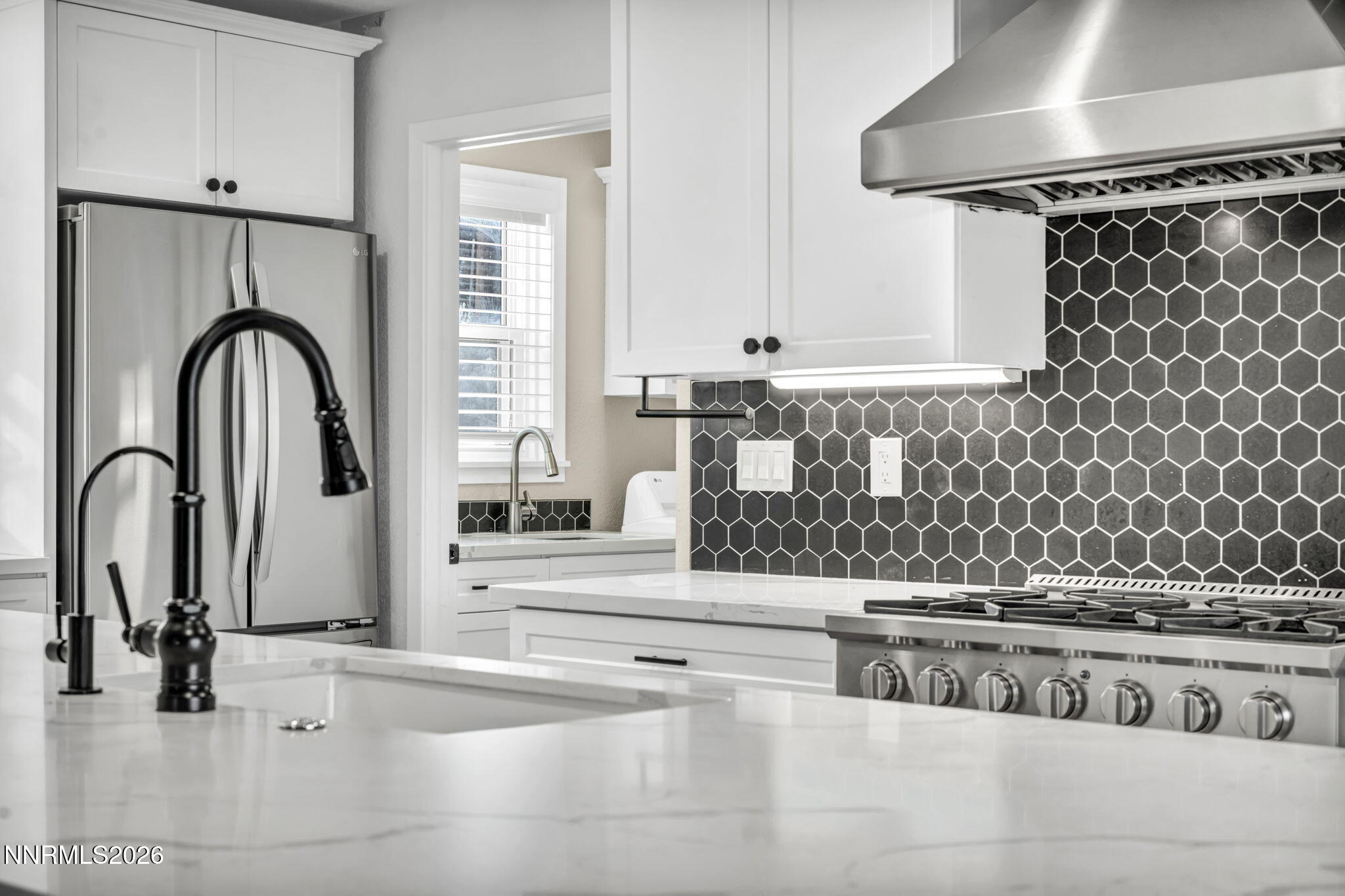 45 Arabian Way Reno, NV 89508 - Photo 23 of 44 a view of a kitchen counter top and has a stove
