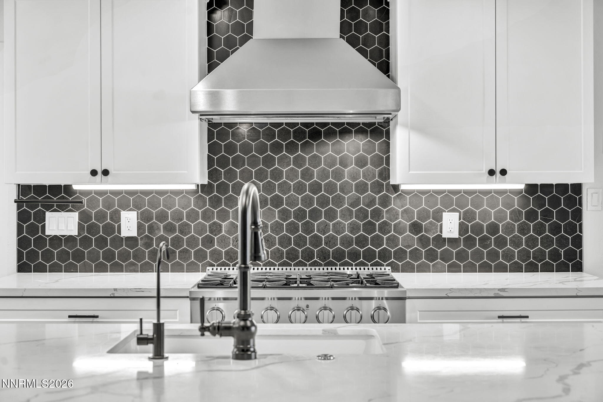 45 Arabian Way Reno, NV 89508 - Photo 25 of 44 a kitchen with a sink and cabinets