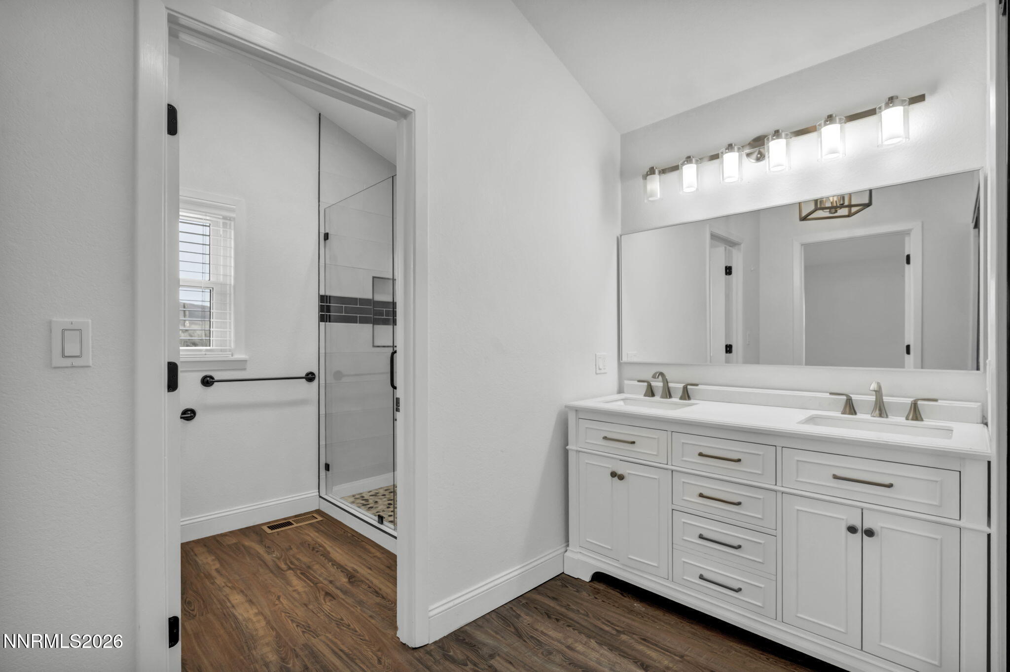 45 Arabian Way Reno, NV 89508 - Photo 39 of 44 a bathroom with a double vanity sink and mirror