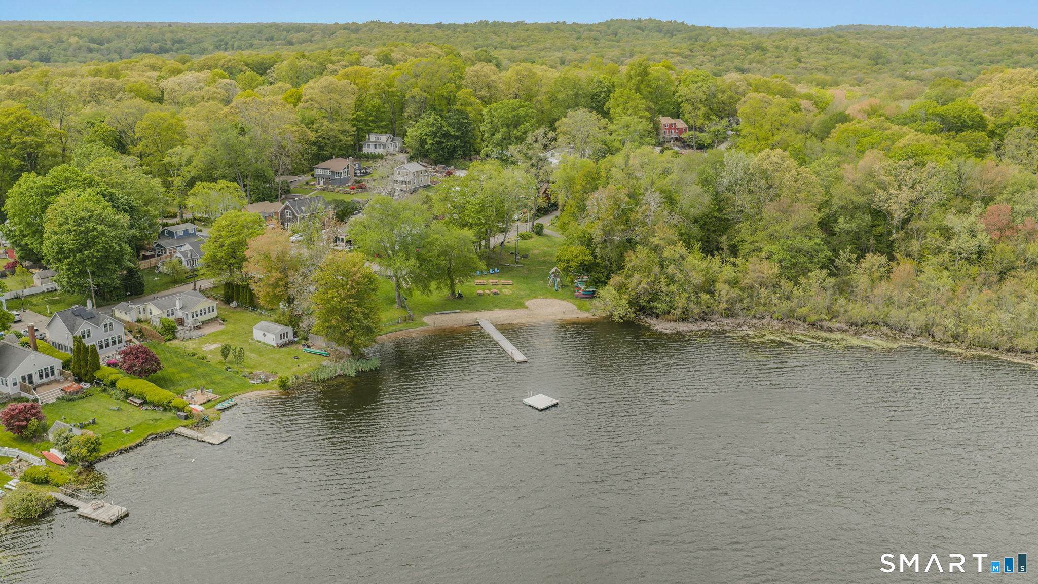 65 Flat Iron Road Guilford, CT 06437 - Photo 35 of 40 Private lake association beach area on West Lake.