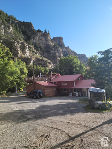 97 East Main Street Stockton, UT 84071 - Photo 4 of 58 View of home with mountain background