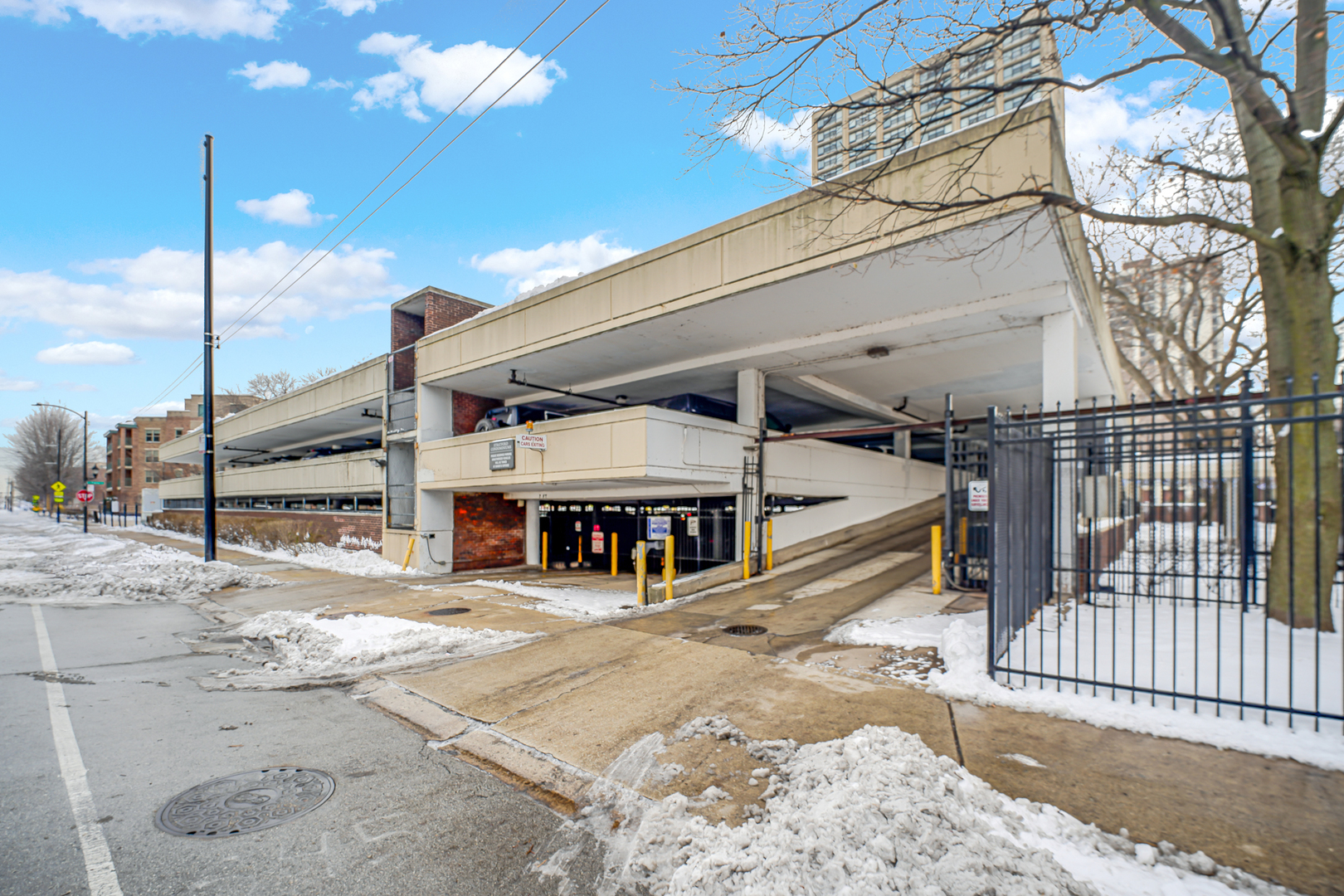 2605 South Indiana Avenue, Unit 402 Chicago, IL 60616 - Photo 22 of 23 a view of a building with a street