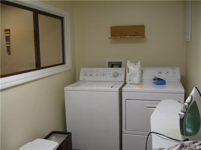 3116 Hope Valley Road Durham, NC 27707 - Photo 19 of 24 Large laundry room on lower level has a big utility closet as well. Laundry Room