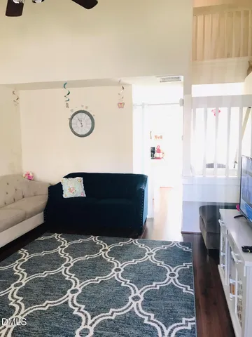 a living room with a couch and a table