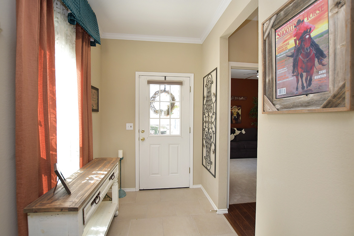 212 Bonham Loop Georgetown, TX 78633 - Photo 4 of 21 A light-filled entry greets you upon entering.