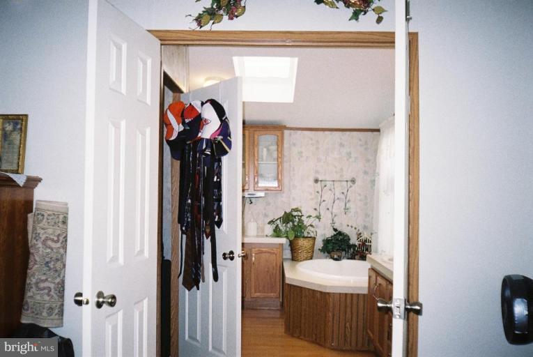 7853 Sellner Road Jessup, MD 20794 - Photo 14 of 28 Double door entryway to master bath.Walk-in closet