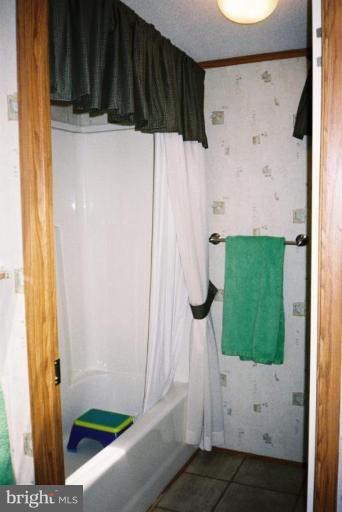 7853 Sellner Road Jessup, MD 20794 - Photo 17 of 28 Hall bathroom has tub & toilet separate section