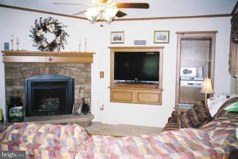 7853 Sellner Road Jessup, MD 20794 - Photo 22 of 28 Built-in TV nook & surround sound system near F/P
