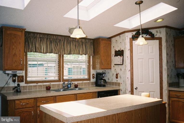 7853 Sellner Road Jessup, MD 20794 - Photo 4 of 28 3 of 4 skylights in the kitchen area