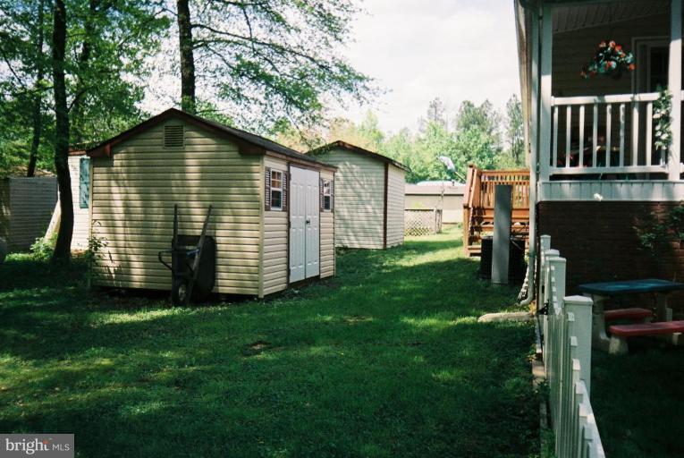 7853 Sellner Road Jessup, MD 20794 - Photo 5 of 28 Large storage shed in side yard conveys