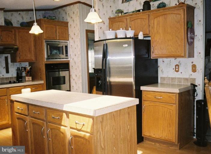 7853 Sellner Road Jessup, MD 20794 - Photo 8 of 28 View from the dining area towards the kitchen