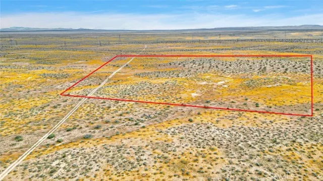 a view of an empty room and an ocean