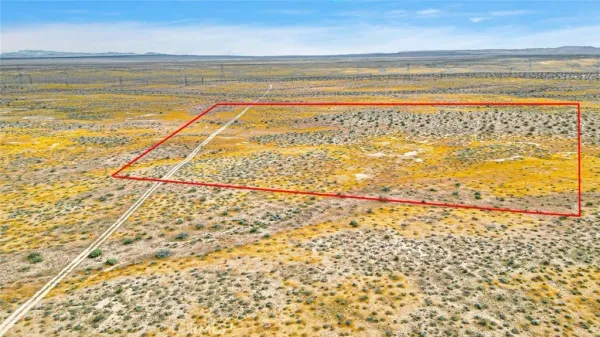 a view of an empty room and an ocean