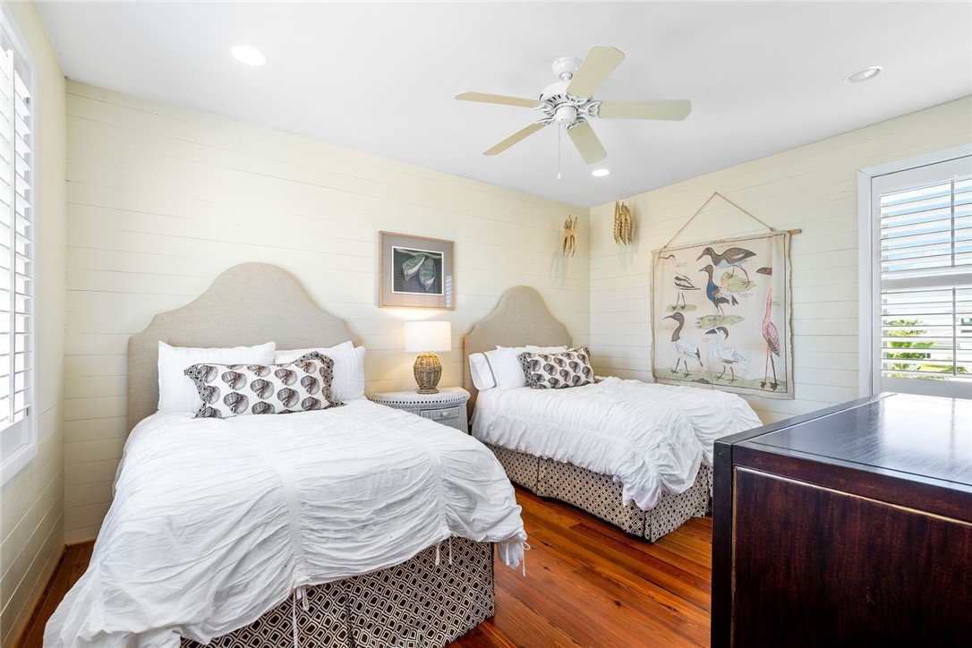 1024 Private Road East Port Aransas, TX 78373 - Photo 16 of 40 a bedroom with double bed and a window