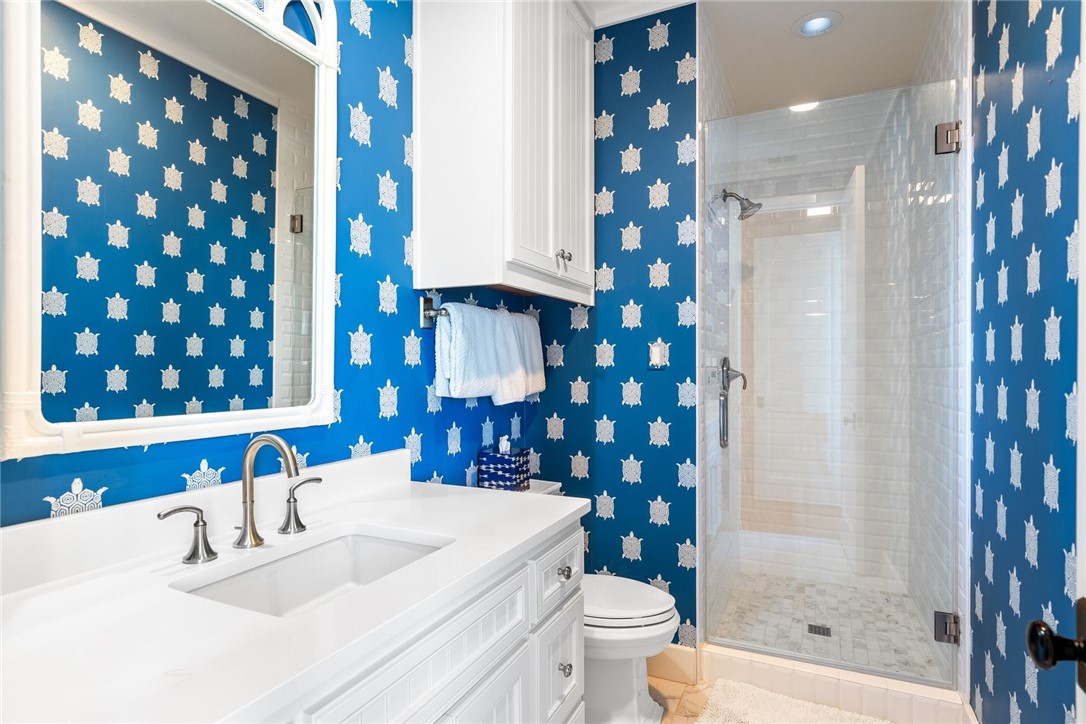 1024 Private Road East Port Aransas, TX 78373 - Photo 25 of 40 a bathroom with a sink a toilet and shower