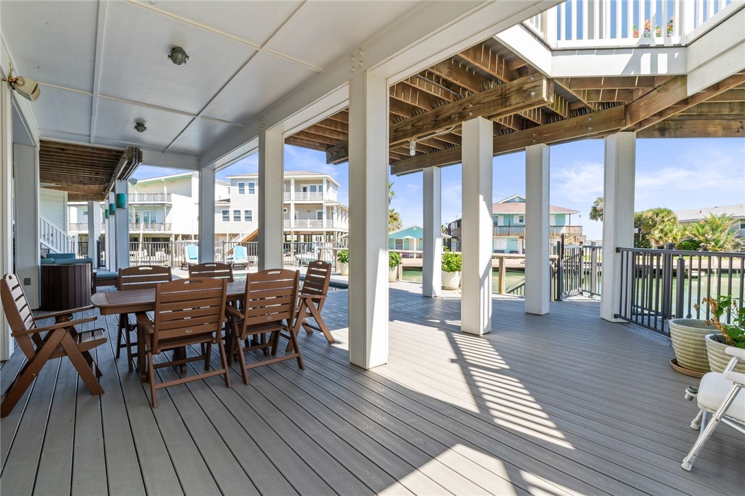 1024 Private Road East Port Aransas, TX 78373 - Photo 31 of 40 a view of a dining room with furniture window and wooden floor