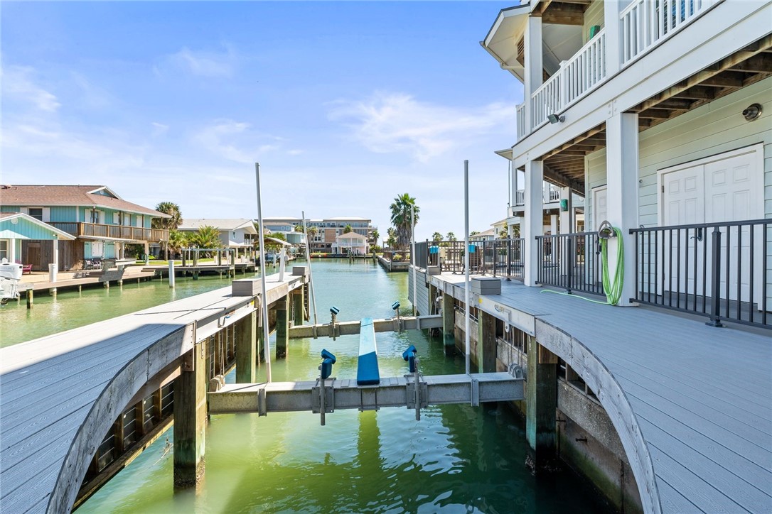 1024 Private Road East Port Aransas, TX 78373 - Photo 38 of 40 a view of residential house with outdoor space and outdoor seating