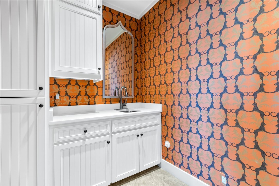 1024 Private Road East Port Aransas, TX 78373 - Photo 10 of 40 a bathroom with a sink and a mirror