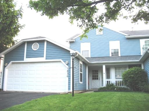 1836 Shetland Road, Unit 1836 Naperville, IL 60565 - Photo 1 of 1 a front view of a house with a yard
