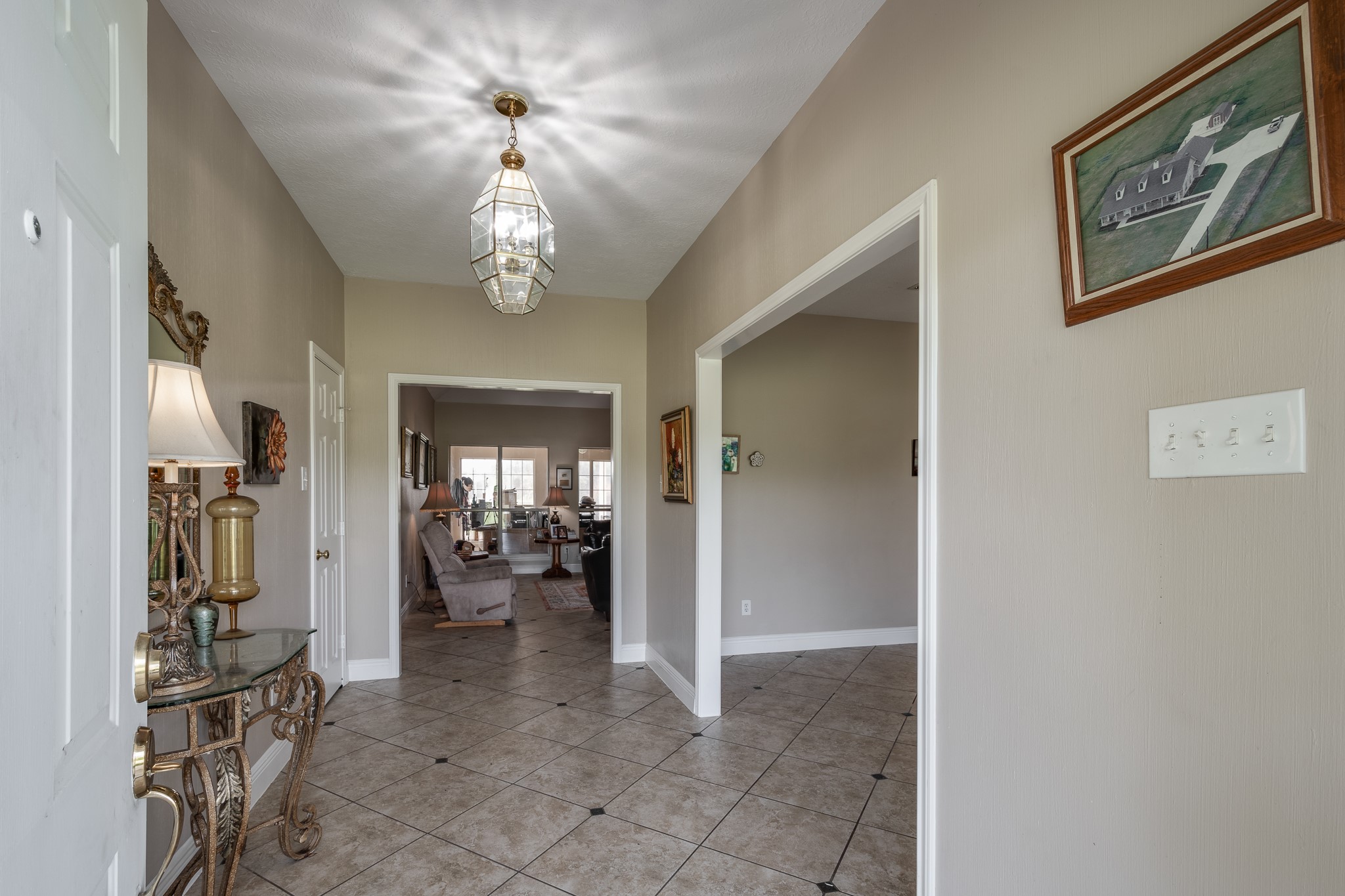 15953 1st Street Splendora, TX 77372 - Photo 4 of 23 a view of a chandelier fan and entryway