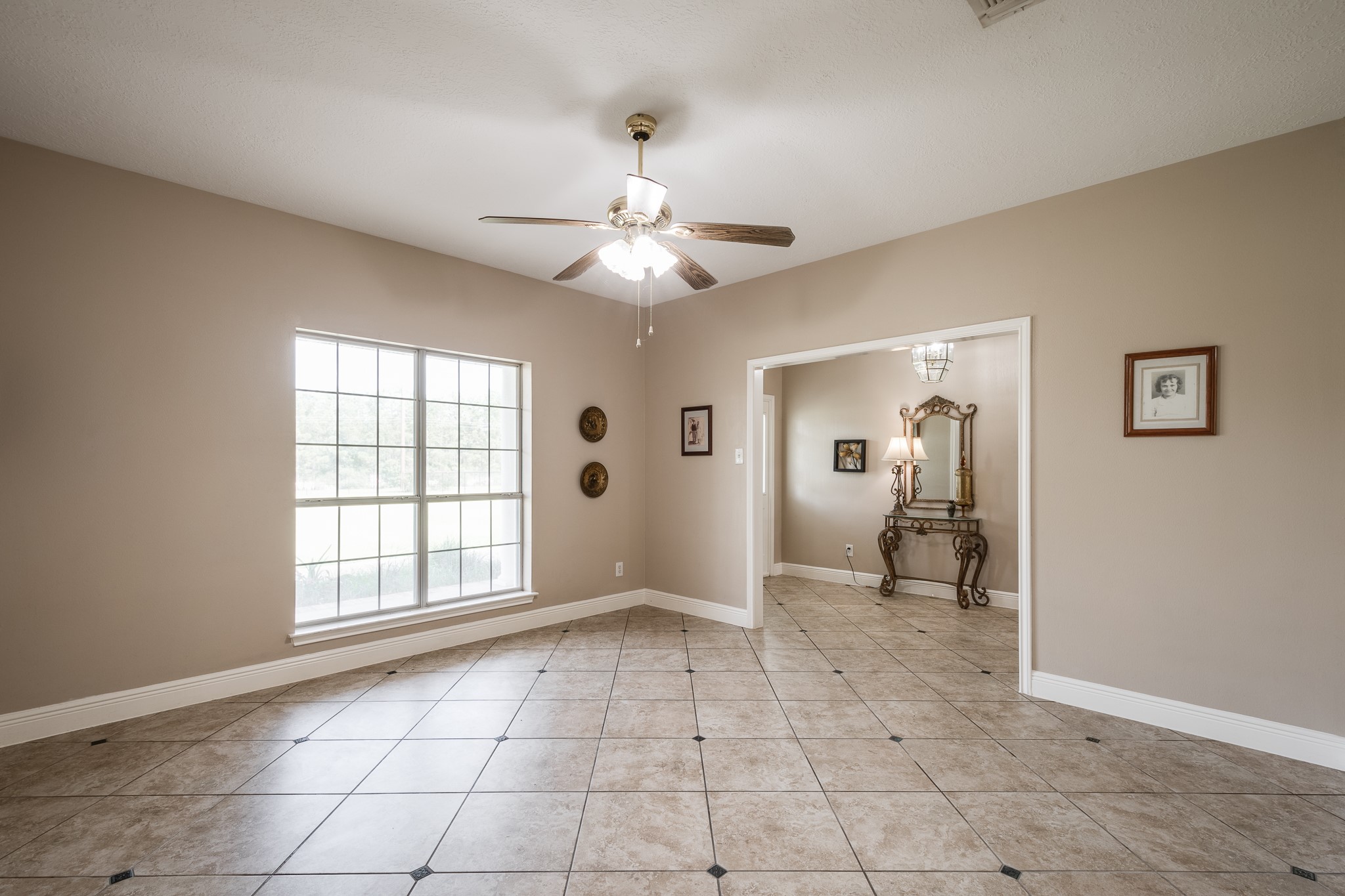 15953 1st Street Splendora, TX 77372 - Photo 7 of 23 a view of an empty room with a window