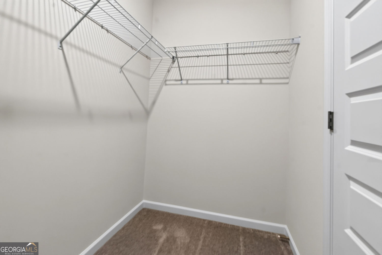 155 Oconee Road, Unit 252 Cartersville, GA 30120 - Photo 23 of 39 a view of a room with racks on the wall