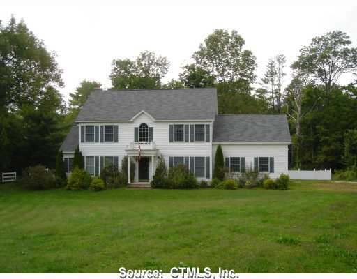 69 Phelps Road Colebrook, CT 06021 - Photo 1 of 1 a front view of a house with a garden