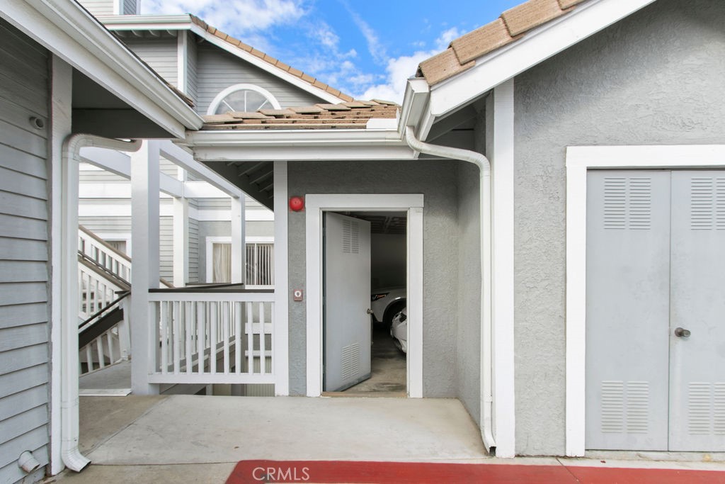 10411 Garden Grove Boulevard, Unit 43 Garden Grove, CA 92843 - Photo 15 of 22 a view of a house with wooden stairs