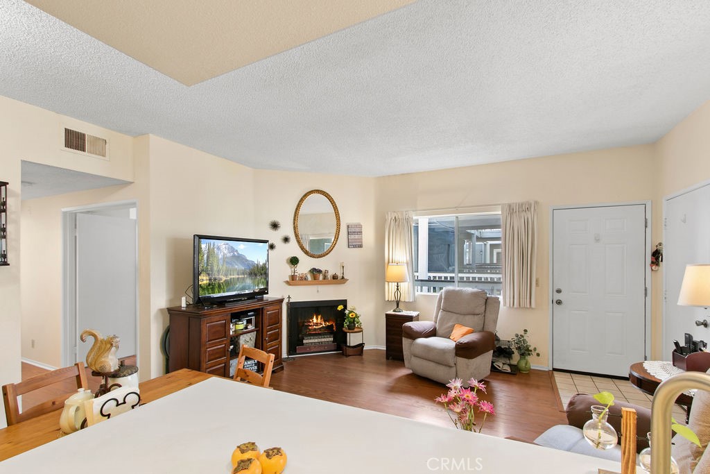 10411 Garden Grove Boulevard, Unit 43 Garden Grove, CA 92843 - Photo 6 of 22 a living room filled with furniture