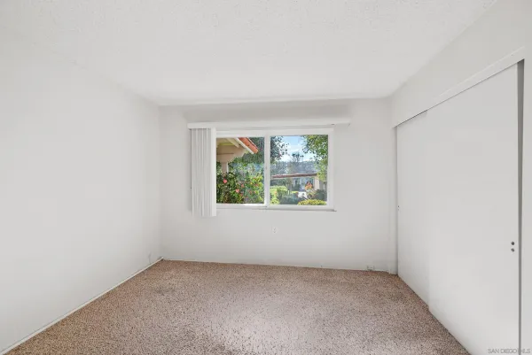 an empty room with a window