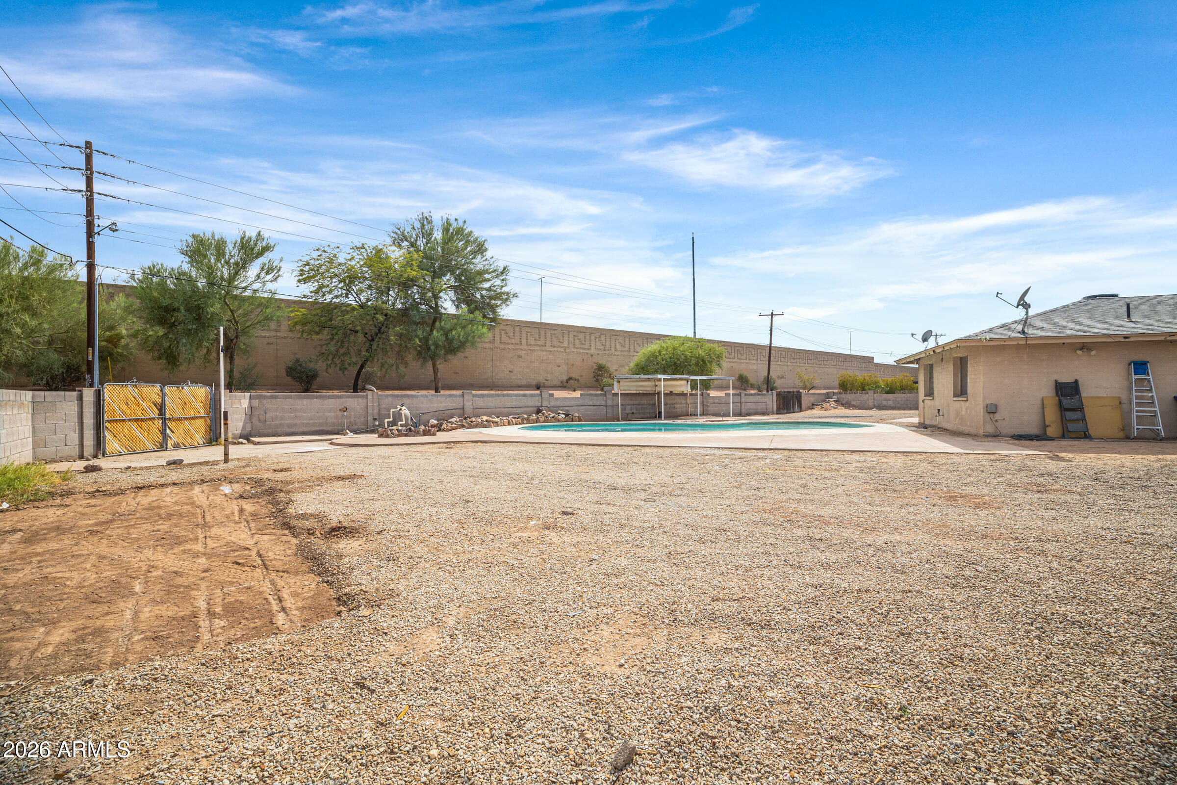 3921 South Kenneth Place Tempe, AZ 85282 - Photo 42 of 43 a view of a house with a yard