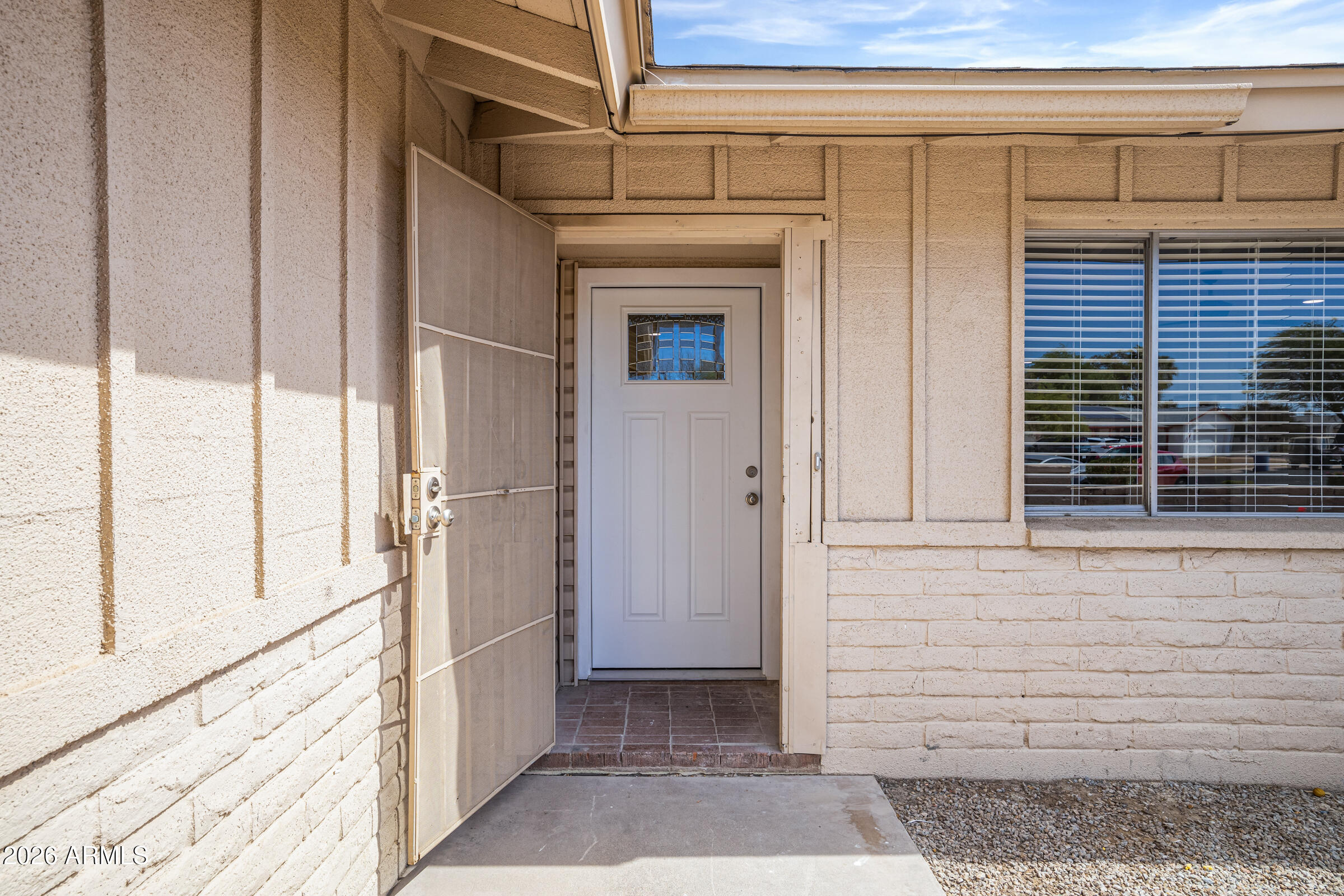 3921 South Kenneth Place Tempe, AZ 85282 - Photo 5 of 43 a view of front door of house