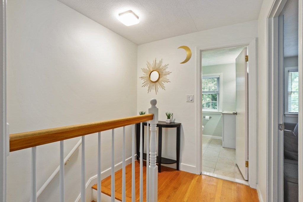 23 Clough Road, Unit 23 Dedham, MA 02026 - Photo 16 of 27 a view of a balcony with wooden floor