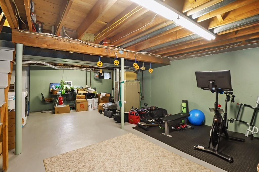 23 Clough Road, Unit 23 Dedham, MA 02026 - Photo 22 of 27 a view of a room with gym equipment