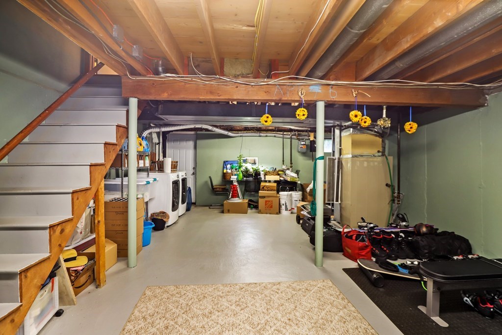 23 Clough Road, Unit 23 Dedham, MA 02026 - Photo 23 of 27 a view of a room with gym equipment